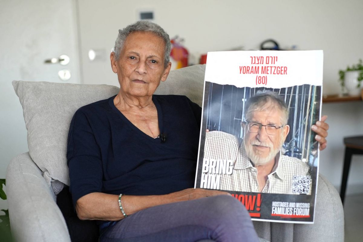 Former Hamas captive mourns husband as Israel celebrates freed hostages