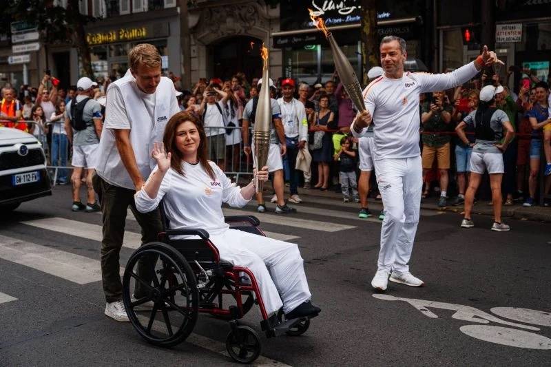 Wounded in Lebanon, journalists Christina Assi and Dylan Collins carry Olympic flame Wounded in Lebanon, journalists Christina Assi and Dylan Collins carry Olympic flame