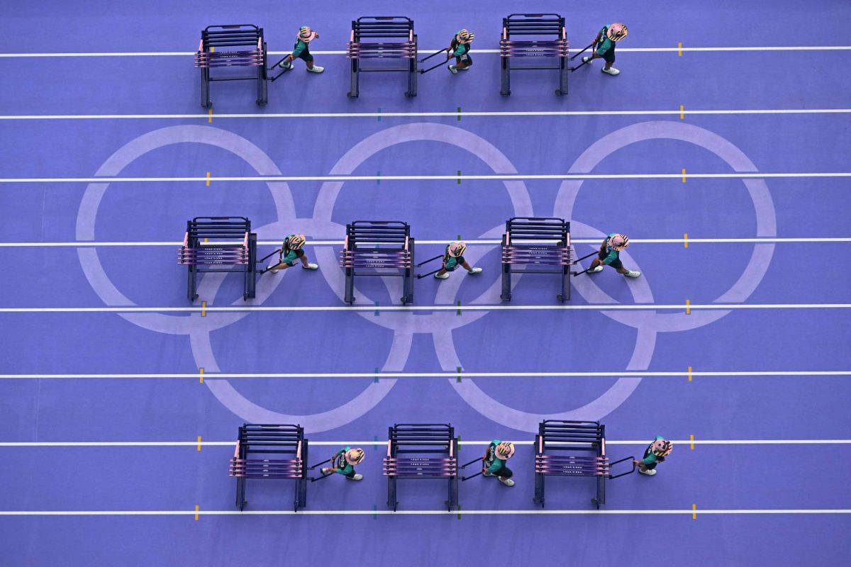 Dans les coulisses de l'arène olympique, la « fierté » des volontaires Dans les coulisses de l'arène olympique, la « fierté » des volontaires