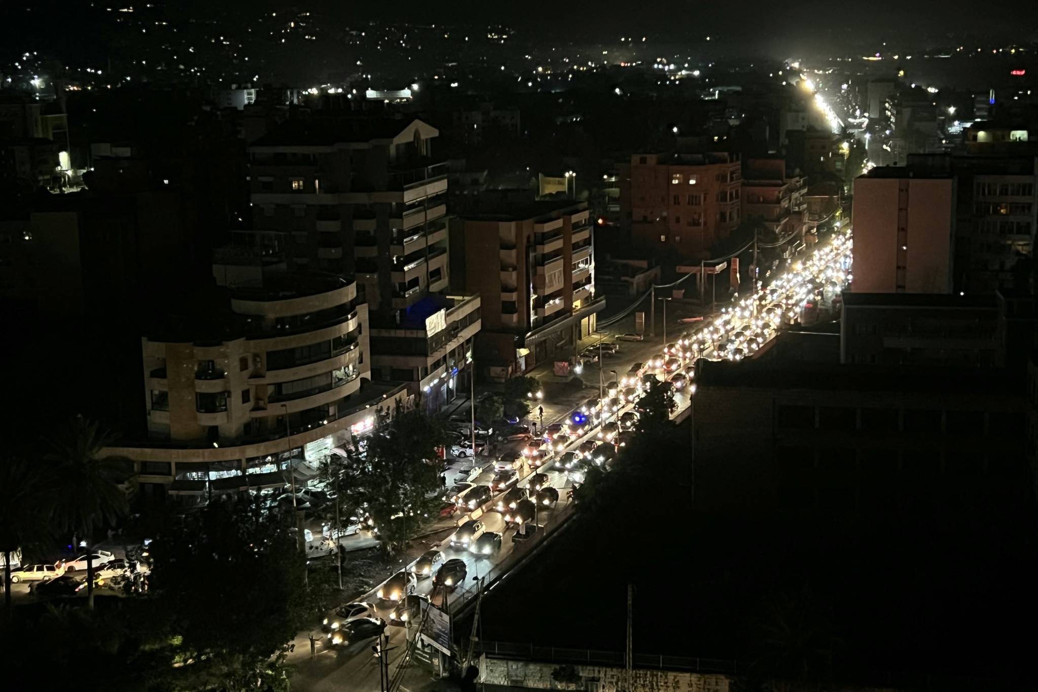 The bombings have forced tens of thousands of people onto the roads, fleeing as quickly as possible from the regions bombarded by Israel. (Credit: Mahmoud Zayyat/AFP)