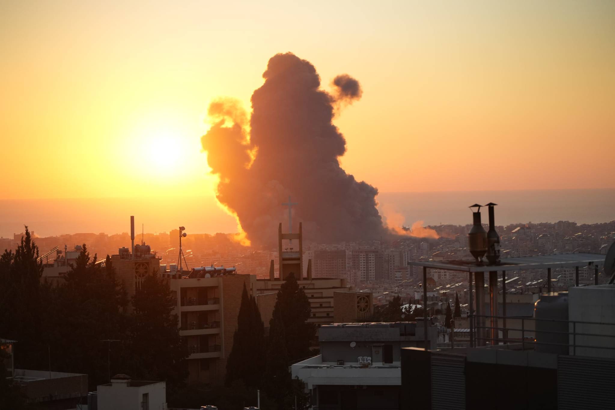 Around 6:20 p.m. on Friday, Sept. 27, 2024, Beirut's southern suburb was the target of a massive Israeli strike. Photo taken from L'Orient Today's offices. (Credit: Mohammad Yassin/L'Orient Today)