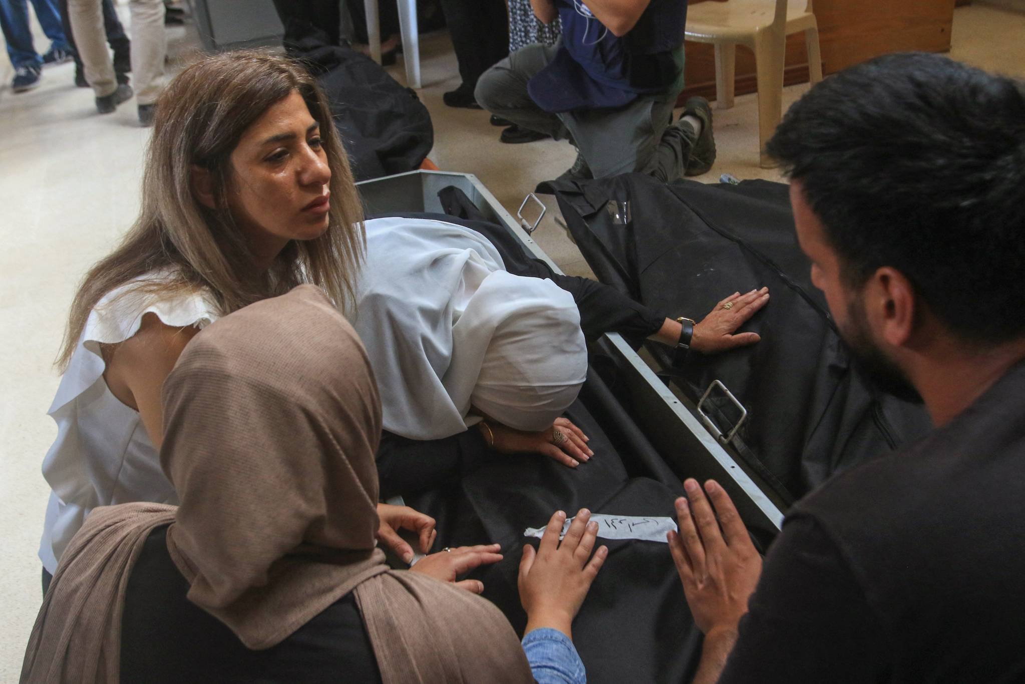 Des vies arrachées qui laissent des proches dans une terrible détresse. Mahmoud Zayyat/AFP
