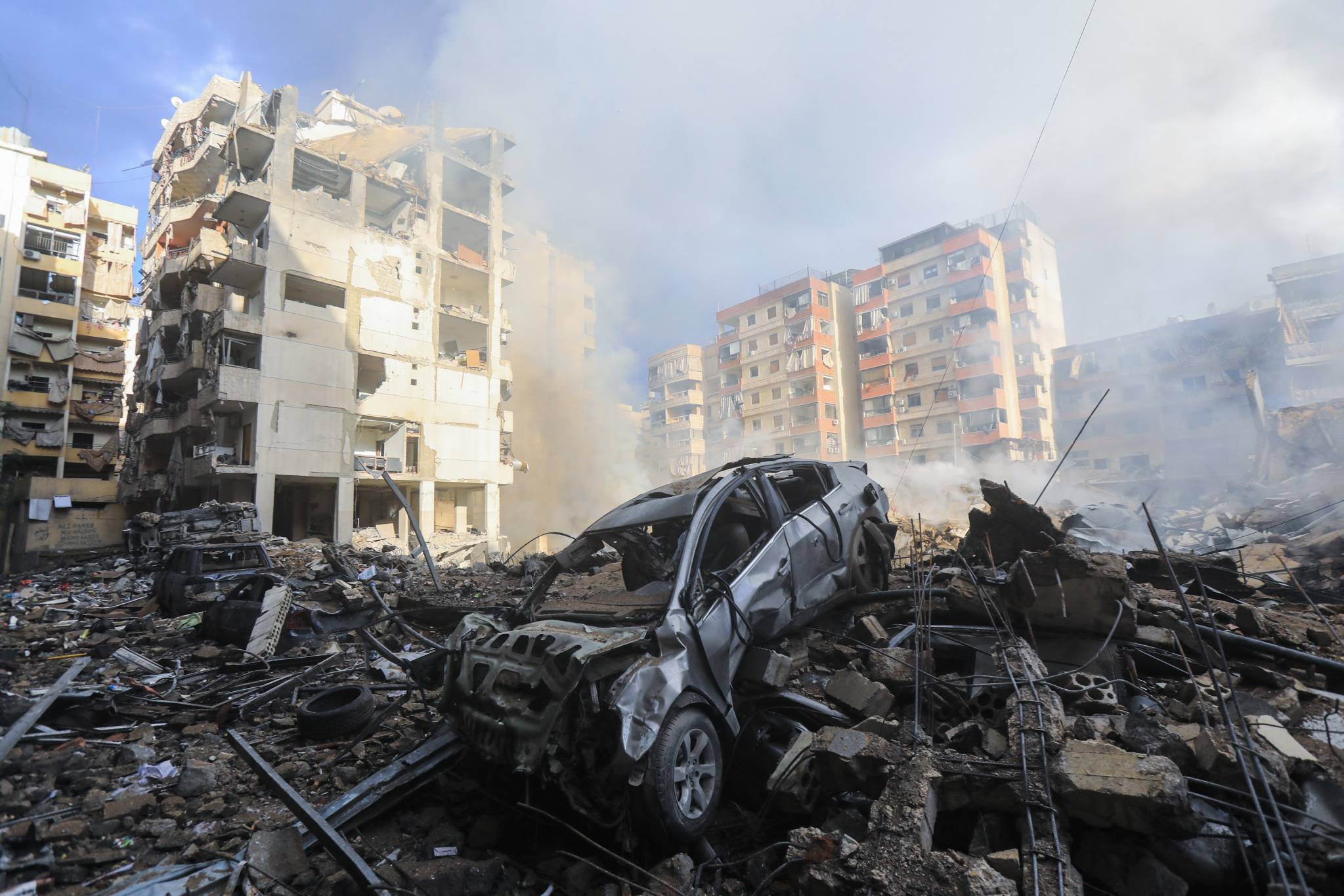 On Monday morning, residents discovered the ruins of buildings struck by the Israeli army overnight, as seen here in the Laylaki neighborhood of southern Beirut. (Credit: Anwar Amro/AFP)