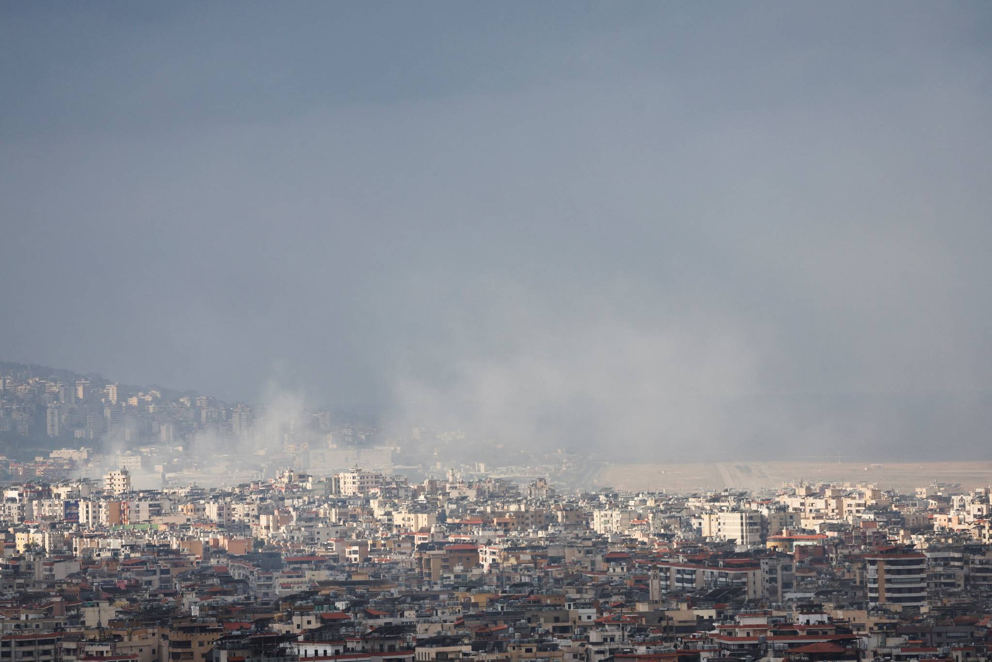 As smoke continued to rise above the southern suburbs of Beirut, not far from Beirut International Airport. (Credit: Amr Abdallah Dalsh/Reuters)