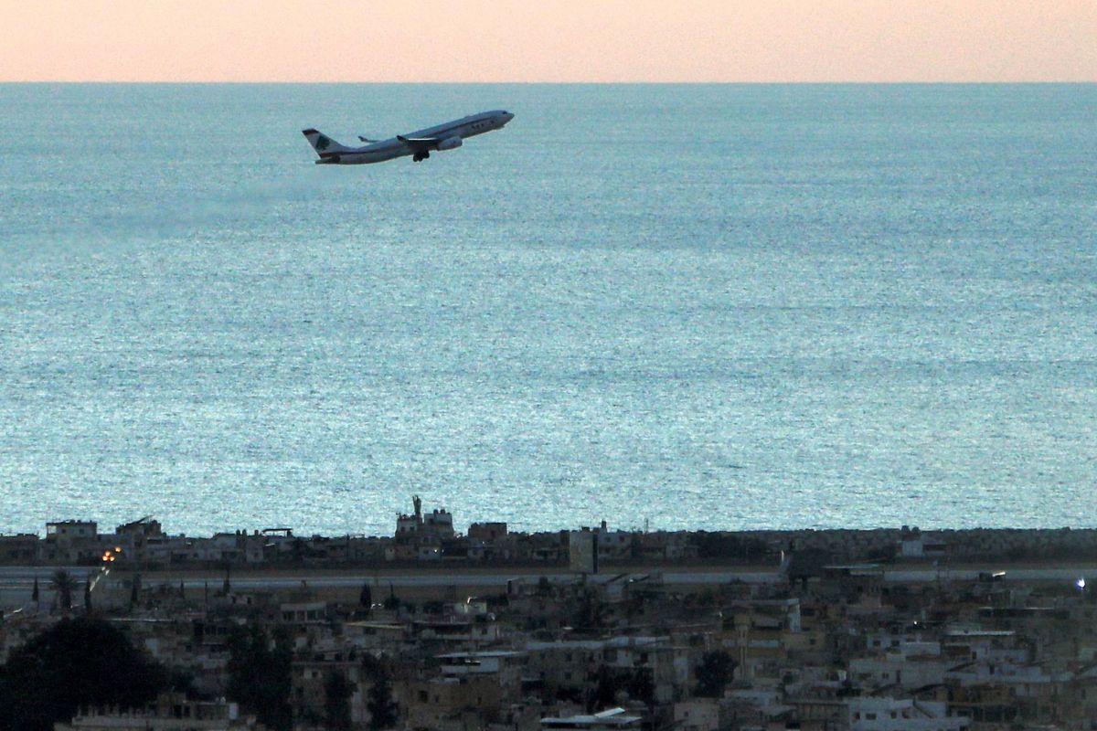 Did an MEA plane have to change its landing because of the Israeli strike on Ouzai?