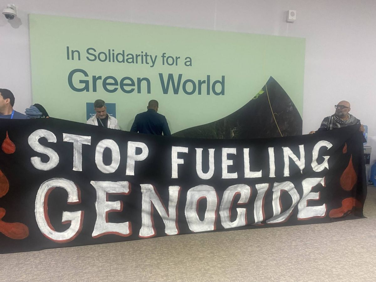 Activists link fossil fuels to 'genocide' Activists link fossil fuels to 'genocide'