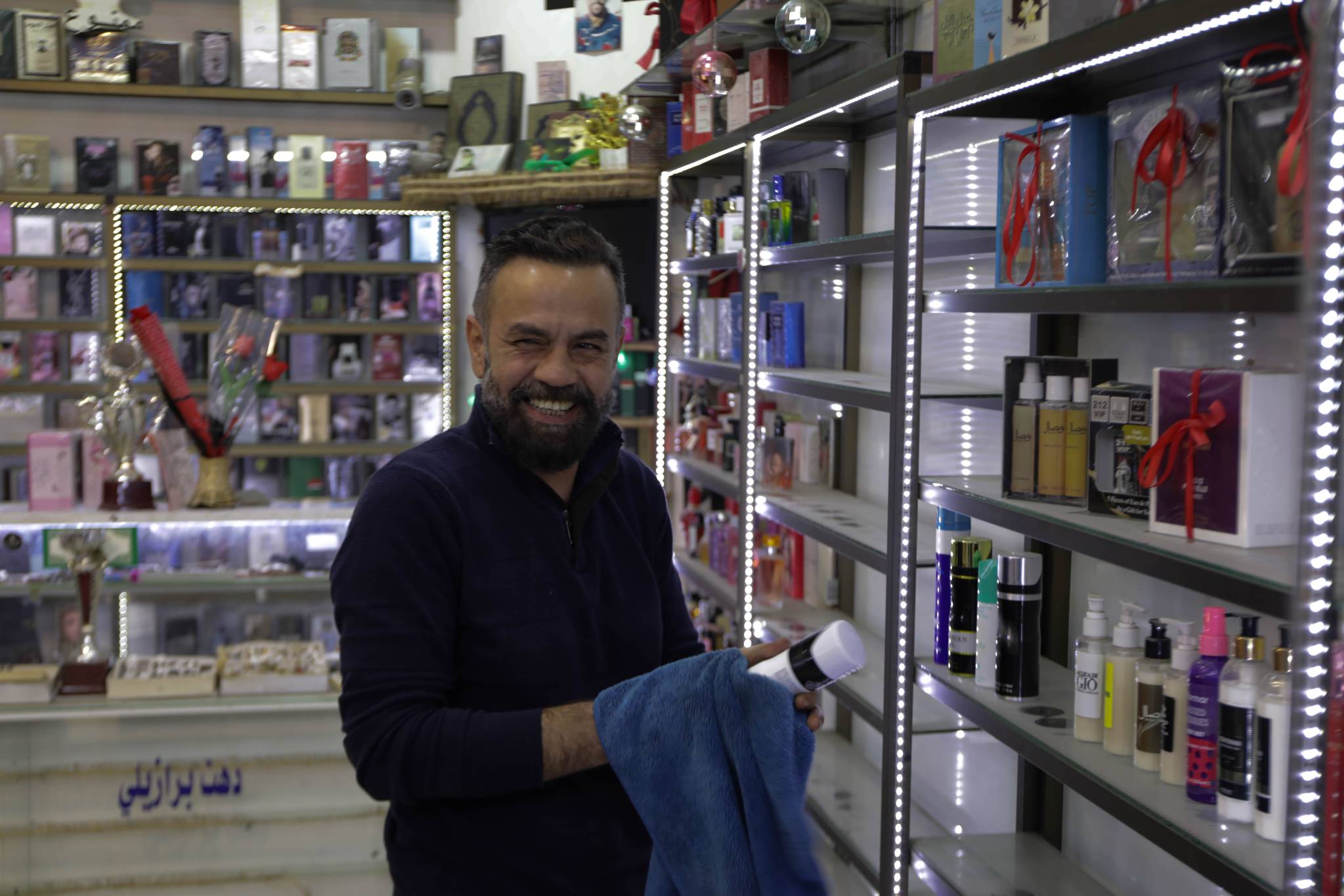 Perfumes. Watches. Lotions. These products may not necessarily be in demand in Beirut’s southern suburbs right now, but storeowners are starting to renovate now so that they are prepared for when the neighborhood is rebuilt and things return to normal. (Credit: Nicholas Frakes/OT)