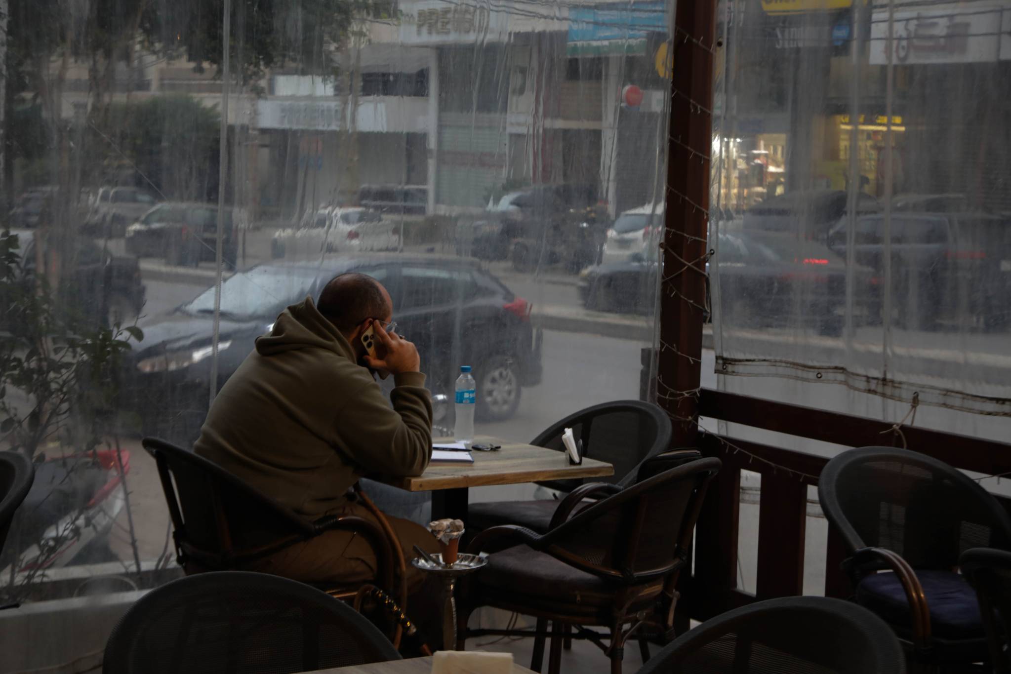 Those who have returned and sit in their neighborhood cafes seem relieved to be back home. (Credit: Nicholas Frakes/OT)
