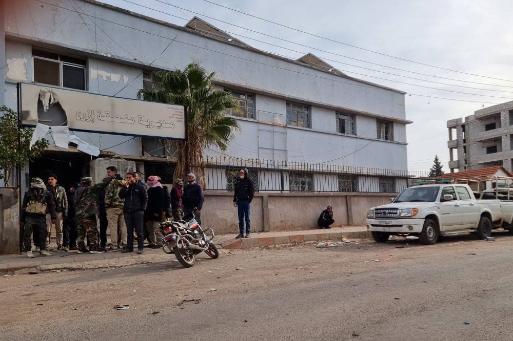 Syrian rebels try to reassure minorities amid the offensive. Syrian rebels try to reassure minorities amid the offensive.