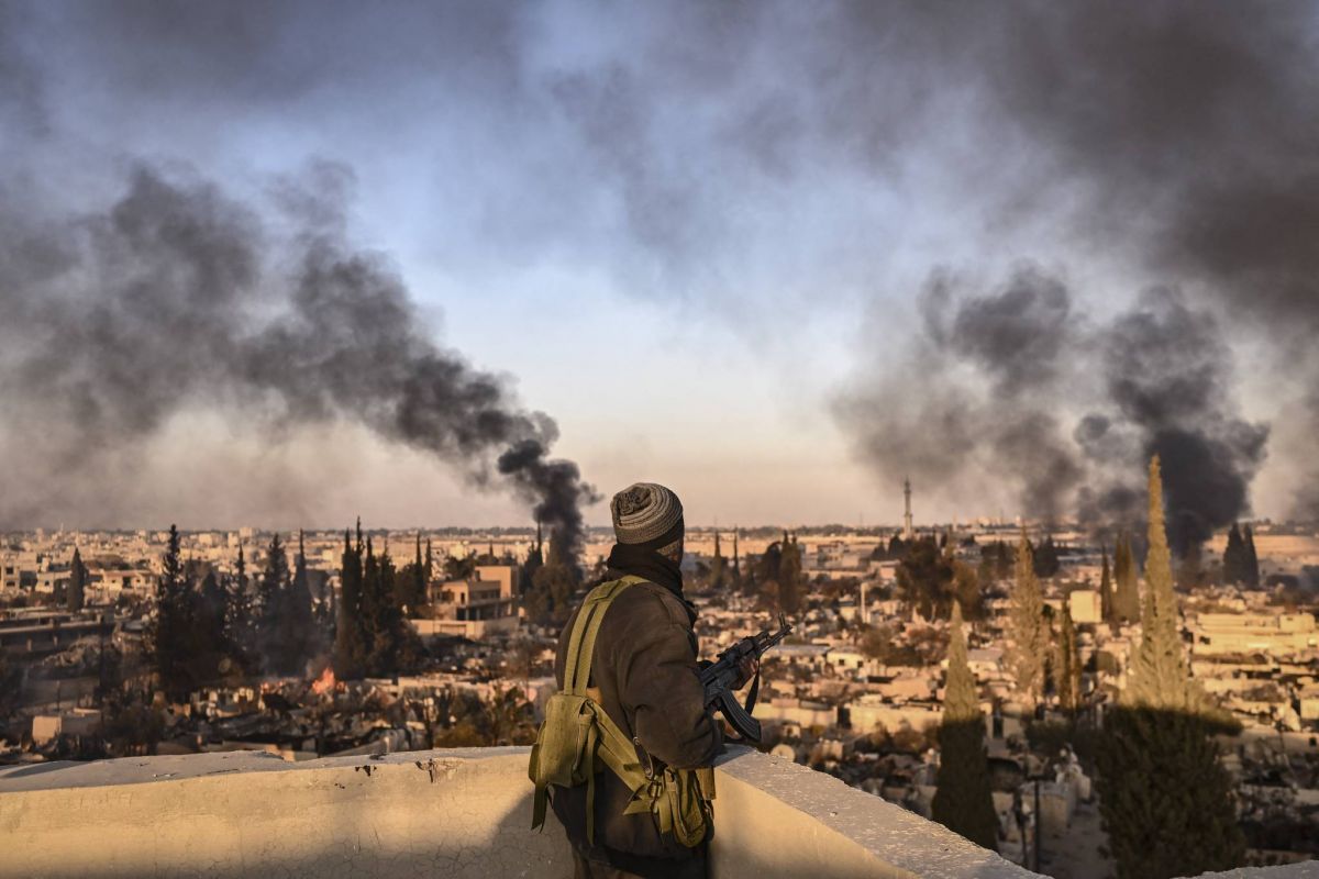 Syria ex-rebel military chief says to dissolve armed wing