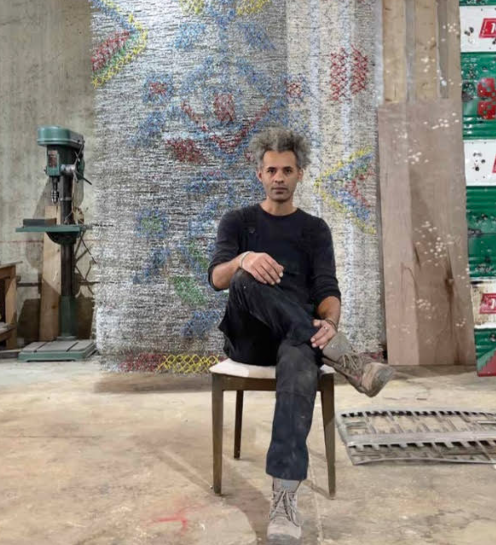 Franco-Palestinian artist Katanani 'weaves' and 'embroiders' the gates of Galilee with barbed wire Franco-Palestinian artist Katanani 'weaves' and 'embroiders' the gates of Galilee with barbed wire