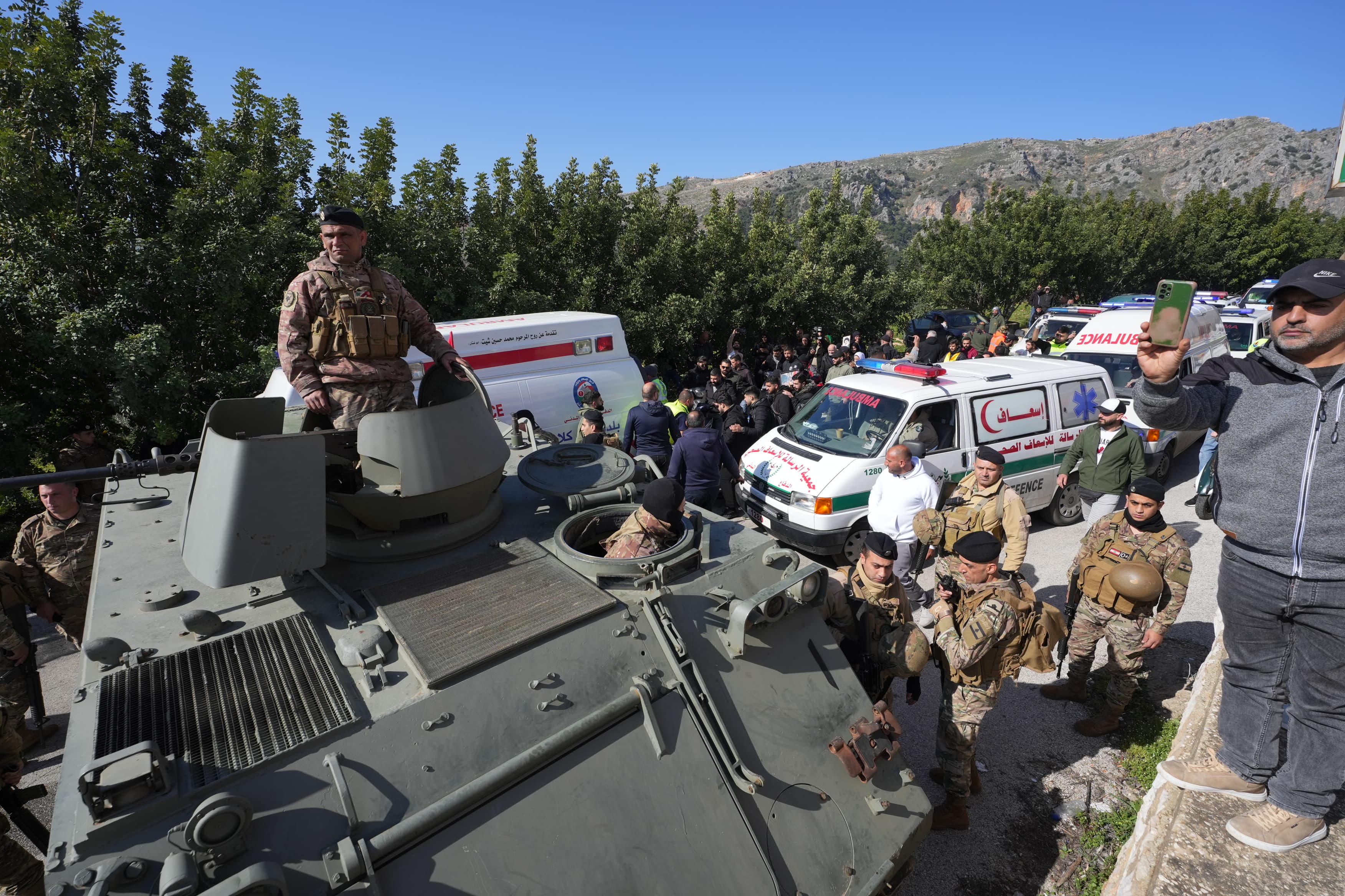 Early Tuesday morning, residents were already waiting for the road linking Deir Mimas and Kfar Kila to be opened by the Lebanese Army. (Credit:  Mohammad Yassine/OLJ)