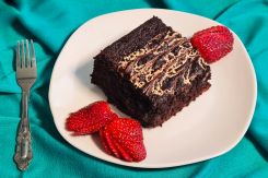 Debs b tahini chocolate cake. (Credit: Nima Salha/Illustration by Jaimee Lee Haddad/L'Orient Today)
