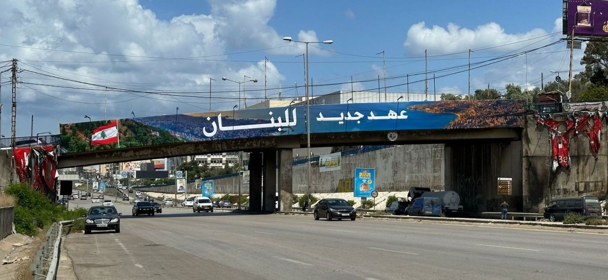 What to know about the burned advertising posters on the airport road What to know about the burned advertising posters on the airport road