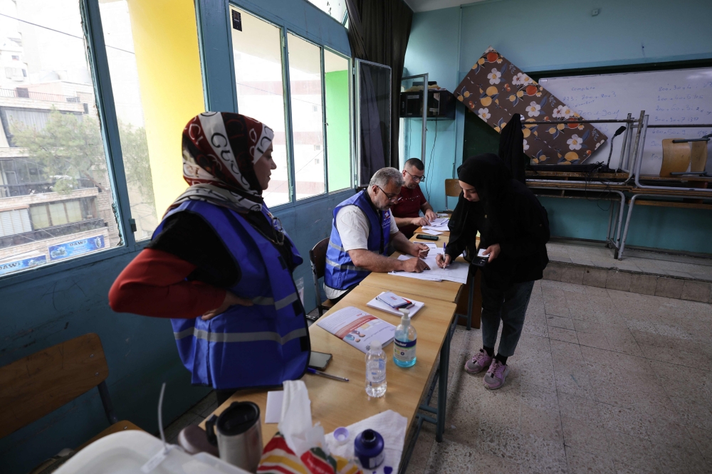 Why did Hezbollah's opposition not participate in the municipal elections