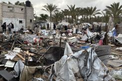 Palestinians inspect the debris at the site of Israeli strikes on a tent camp for displaced people in the Mawasi area west of Khan Younis in the southern Gaza Strip, on May 18, 2025. (Credit: AFP)