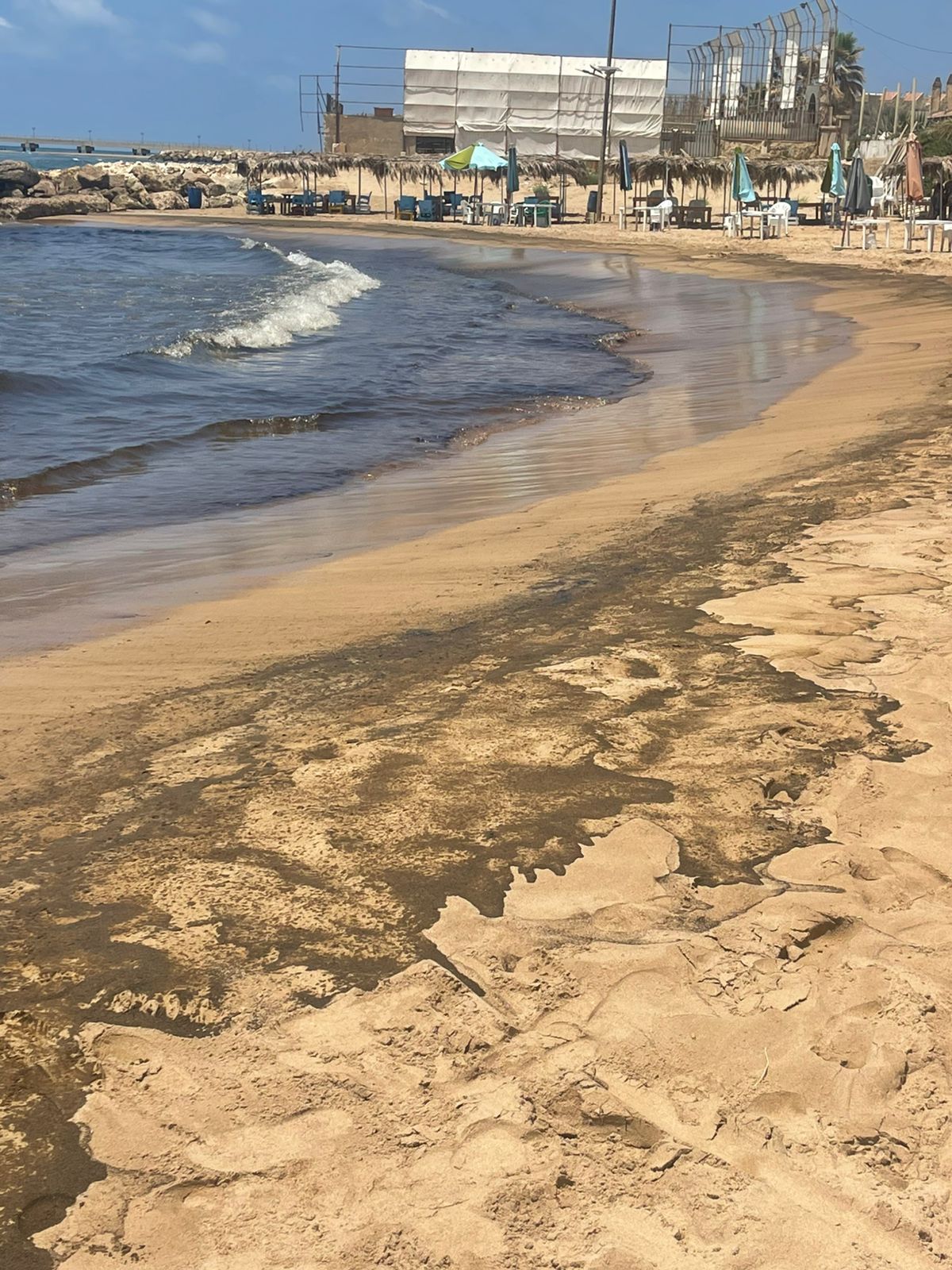 Oil spill contained in the sea at Jiyeh