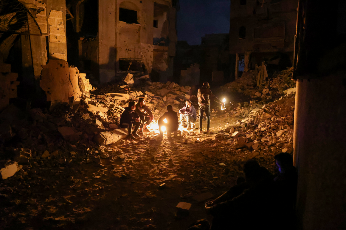 Battling to survive, Hamas faces defiant clans and doubts over Iran