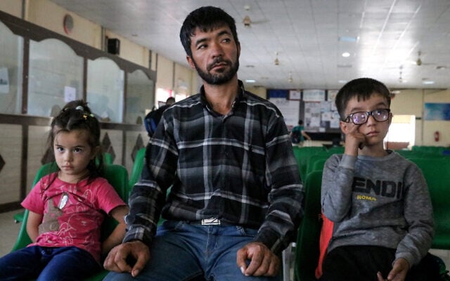 'Thrown out like trash': Afghans return to land they hardly know