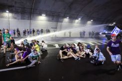 Israeli police use a water cannon to disperse demonstrators blocking traffic in a tunnel, as families and supporters of Israelis held hostages stage a protest calling for government action to secure their release in Jerusalem on Aug. 17, 2025. (Credit: Menahem Kahana/AFP)