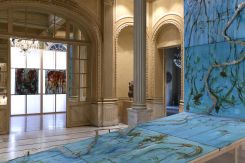 In the foreground, the first "altar" by Ghassan Zard, an installation of horizontal and vertical paintings and sculptures titled "Veins of Ascent." Courtesy of the artist.