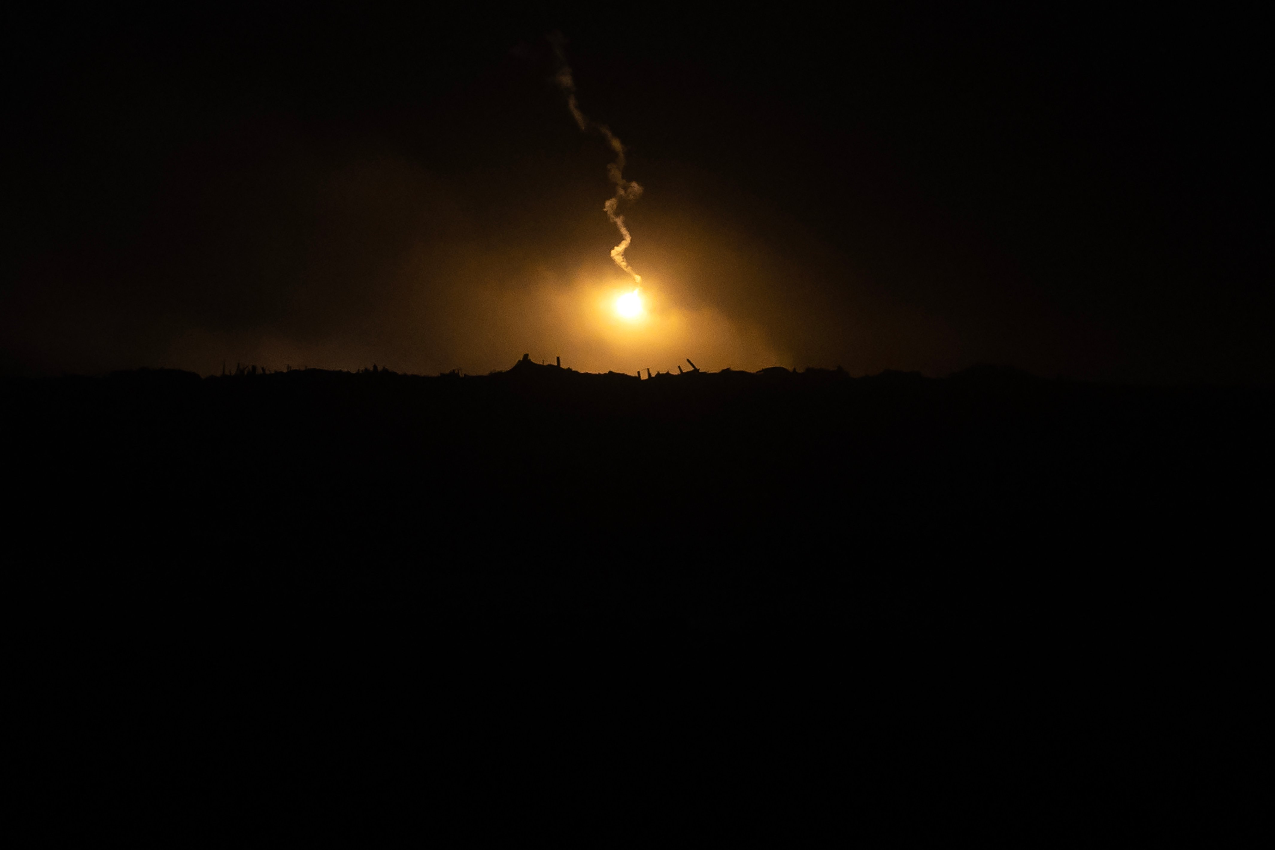 The flare of an Israeli flash grenade over the northern Gaza Strip, as seen from southern Israel, Oct. 29, 2025. (Credit: Fadel Senna/AFP)
