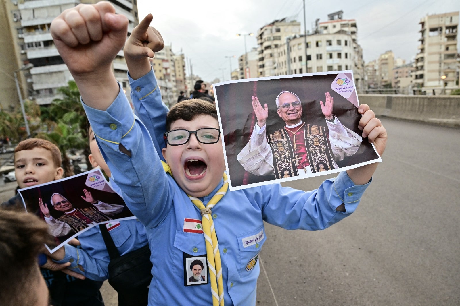 The crowds were mainly composed of Christians, but many others from all religions also joined. Shortly after his arrival, the Pope traveled through Beirut’s southern suburbs — targeted by Israeli strikes only days earlier — where al-Mahdi scouts, affiliated with Hezbollah, organized a marching band to welcome him. (Credit: Giuseppe Cacace/AFP)