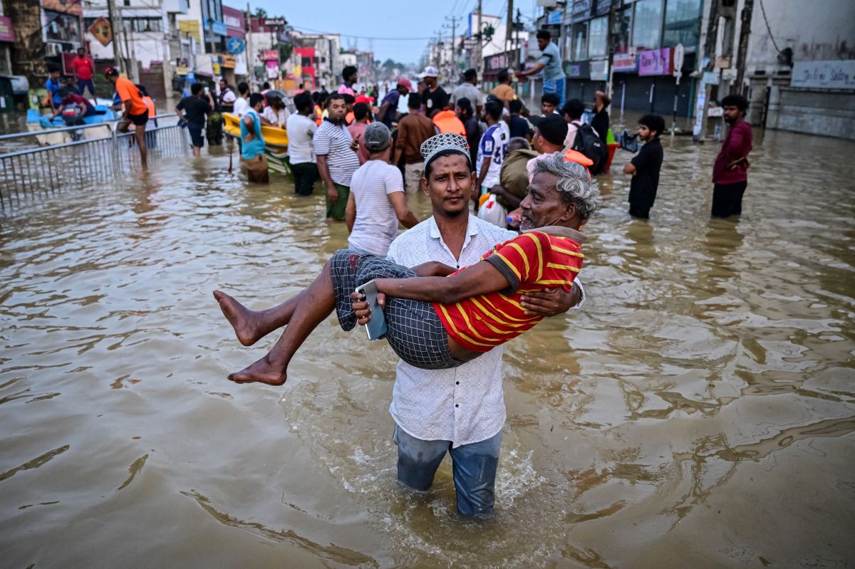 Race to get aid to Asia flood survivors as toll tops 1,200
