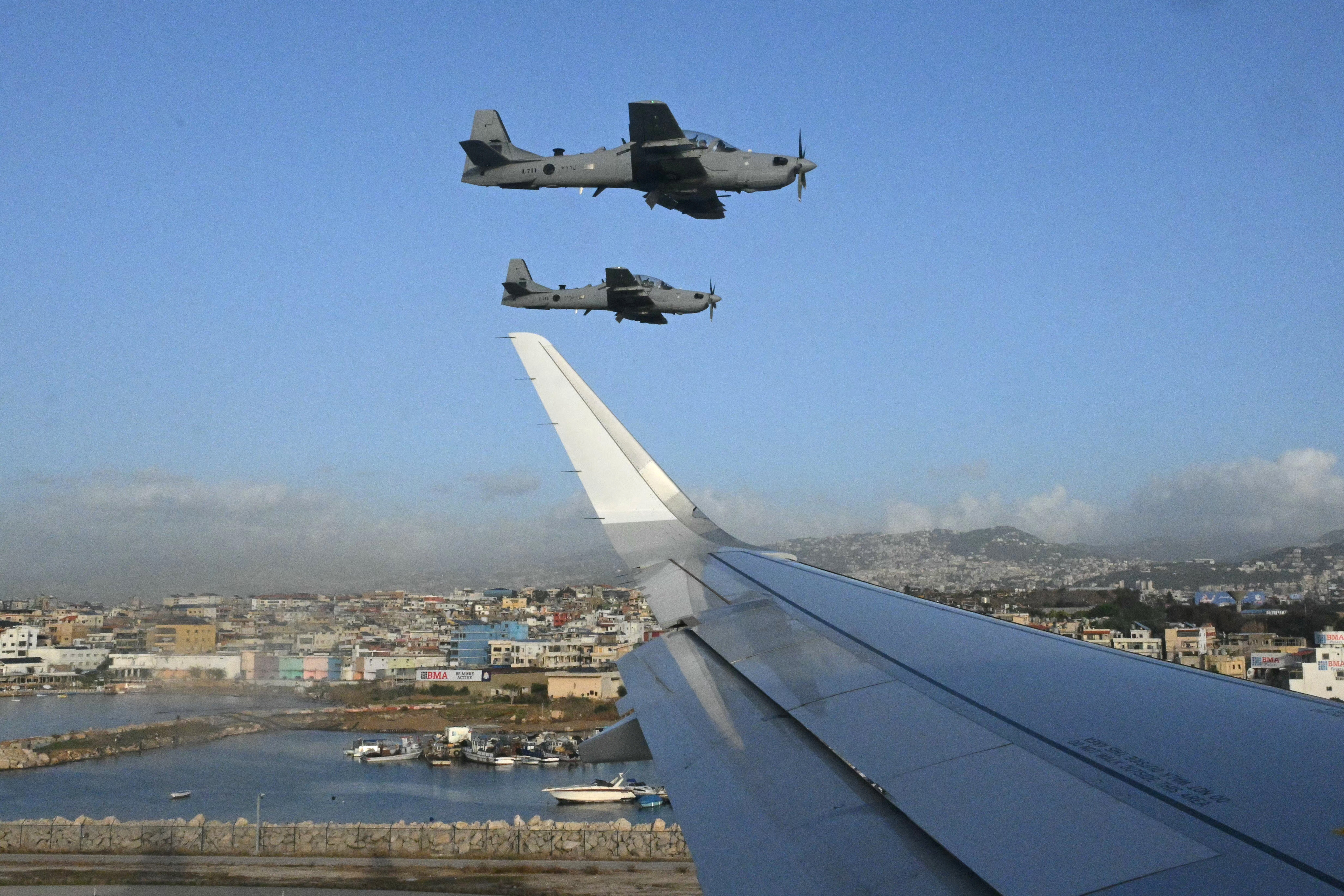 Marking the start of the 4th visit by a sovereign pontiff to Lebanon, Lebanese Air Force aircraft escorted the papal plane as it approached Beirut Rafic Hariri Airport on the afternoon of Nov. 30. (Credit: Andreas Solaro/AFP)