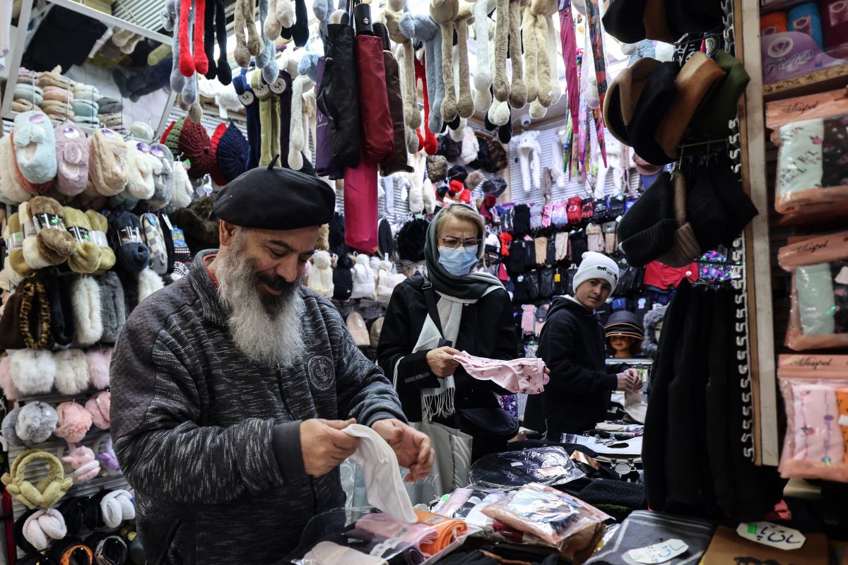 Tehran shopkeepers shut stores over economic pain, currency volatility