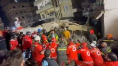 Rescuers at the site of the collapsed building in Qobbeh, northern Lebanon, on the night of Jan. 24 to 25, 2026. (Screenshot from a video obtained by our correspondent Michel Hallak)