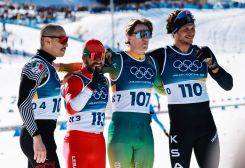 The Lebanese Samer Tawk (center) surrounded by the South African Matthew Smith (second from the right), the Mexican Allan Corona (left), and the Saudi Rakan Alireza (right), at the finish of the 10 km individual cross-country skiing event at the Milan-Cortina Winter Olympics, February 13, 2025. Photo Stephanie Lecocq/Reuters