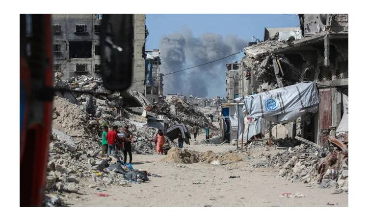 Israeli fire kills three people in Gaza, medics and Israeli army say