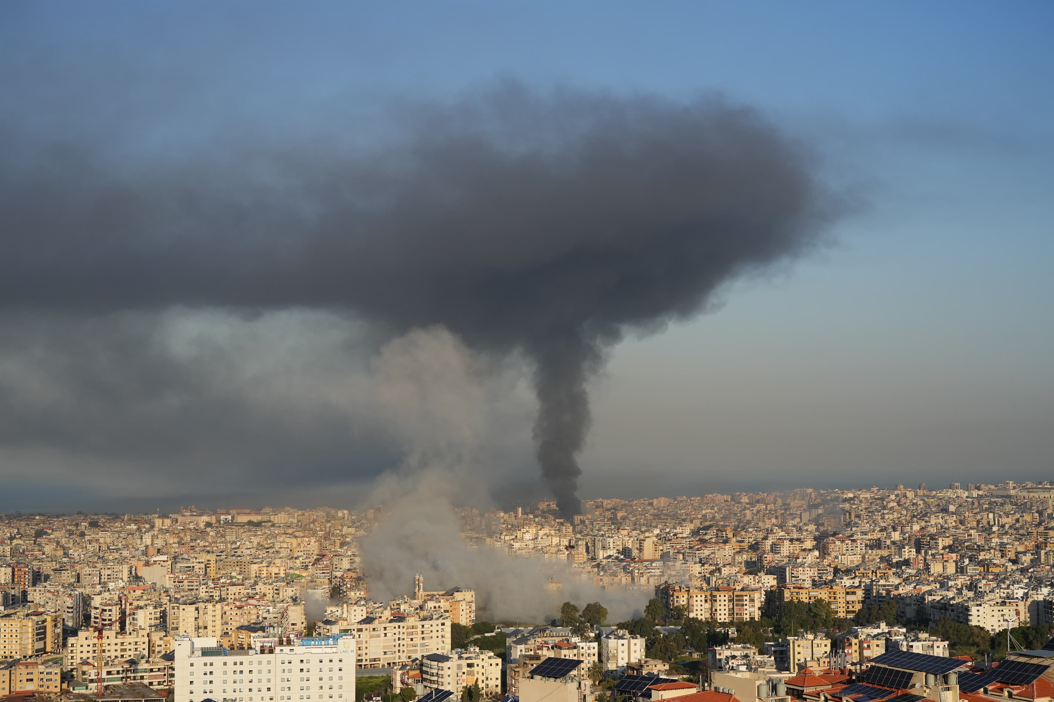 Dawn brought no respite. A thick cloud of black smoke blankets the capital and its suburbs after renewed strikes in the early hours of March 3, 2026. (Credit: Mohammad Yassine/L’Orient Today)