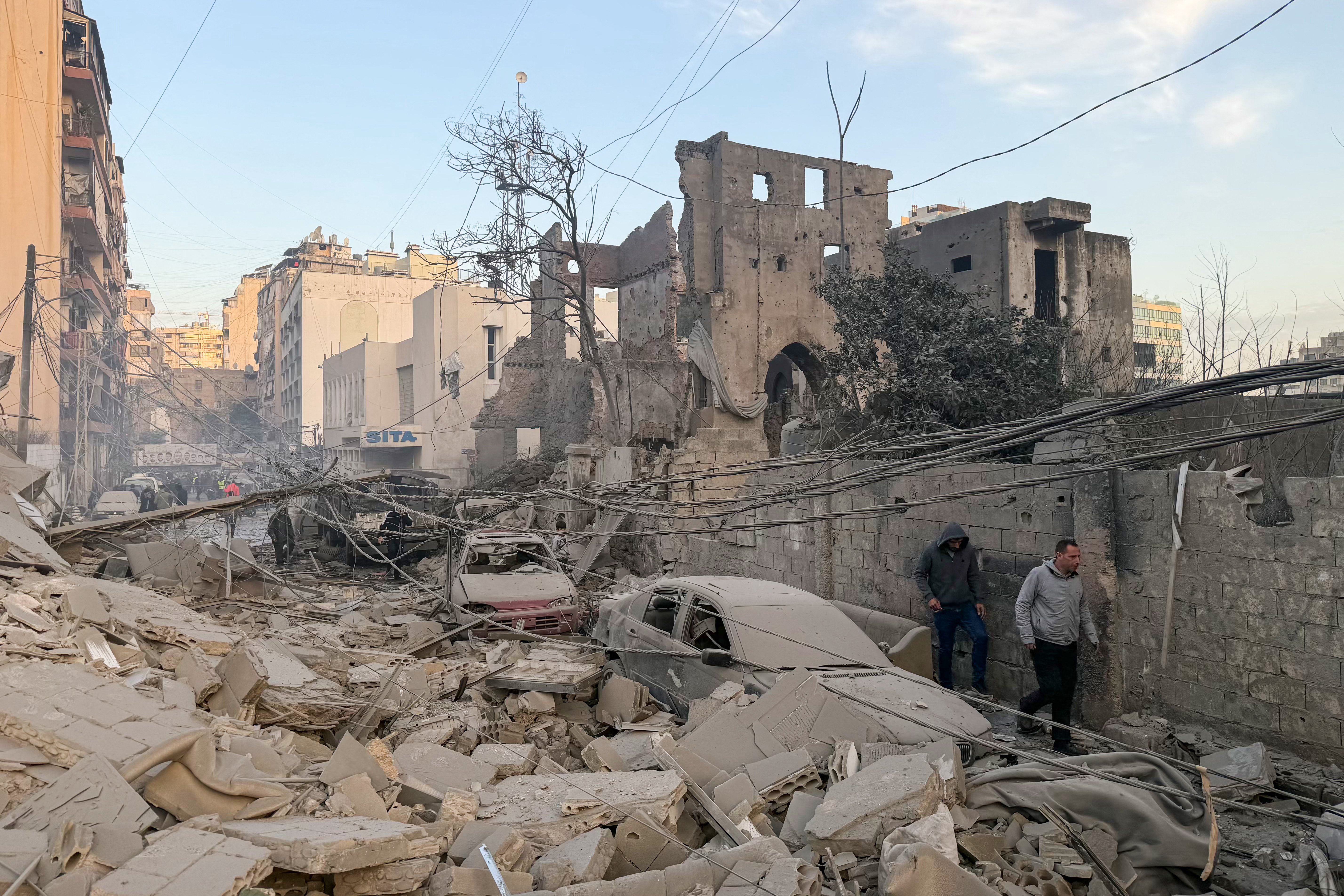 In Bashoura, the targeted building collapsed entirely, causing extensive damage. (Credit: Ibrahim Amro/AFP)
