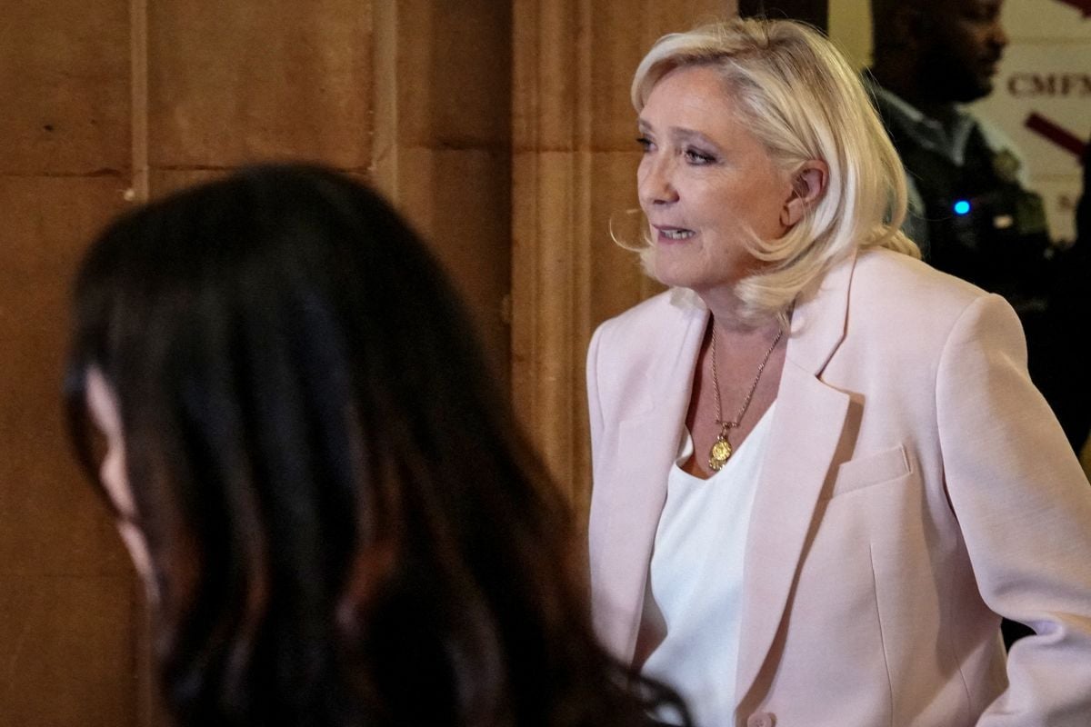 Court opens door to possible Le Pen presidential run, with ankle tag