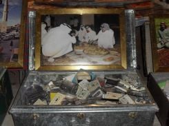 A weathered trunk overflowing with unique cassette tapes. (Credit: Yara Malke/L'Orient Today)