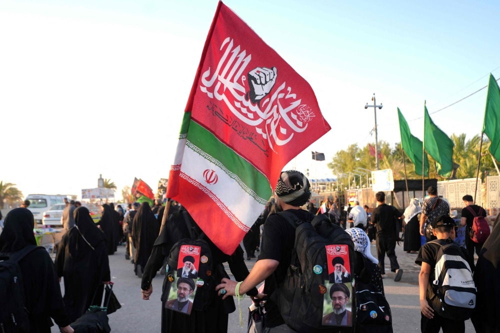 US, Saudis attack Iran-backed groups in Iraq killing at least 20