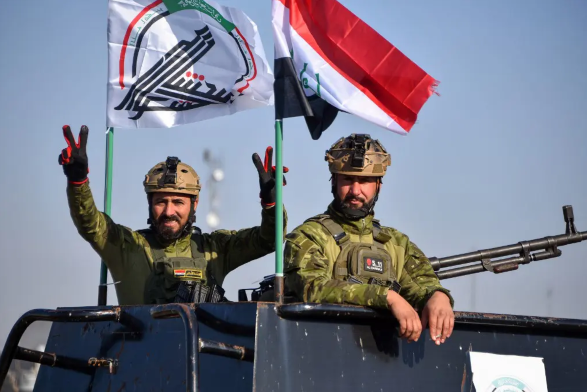 Iraqi faction hands over drones and missiles to government in presence of US representatives