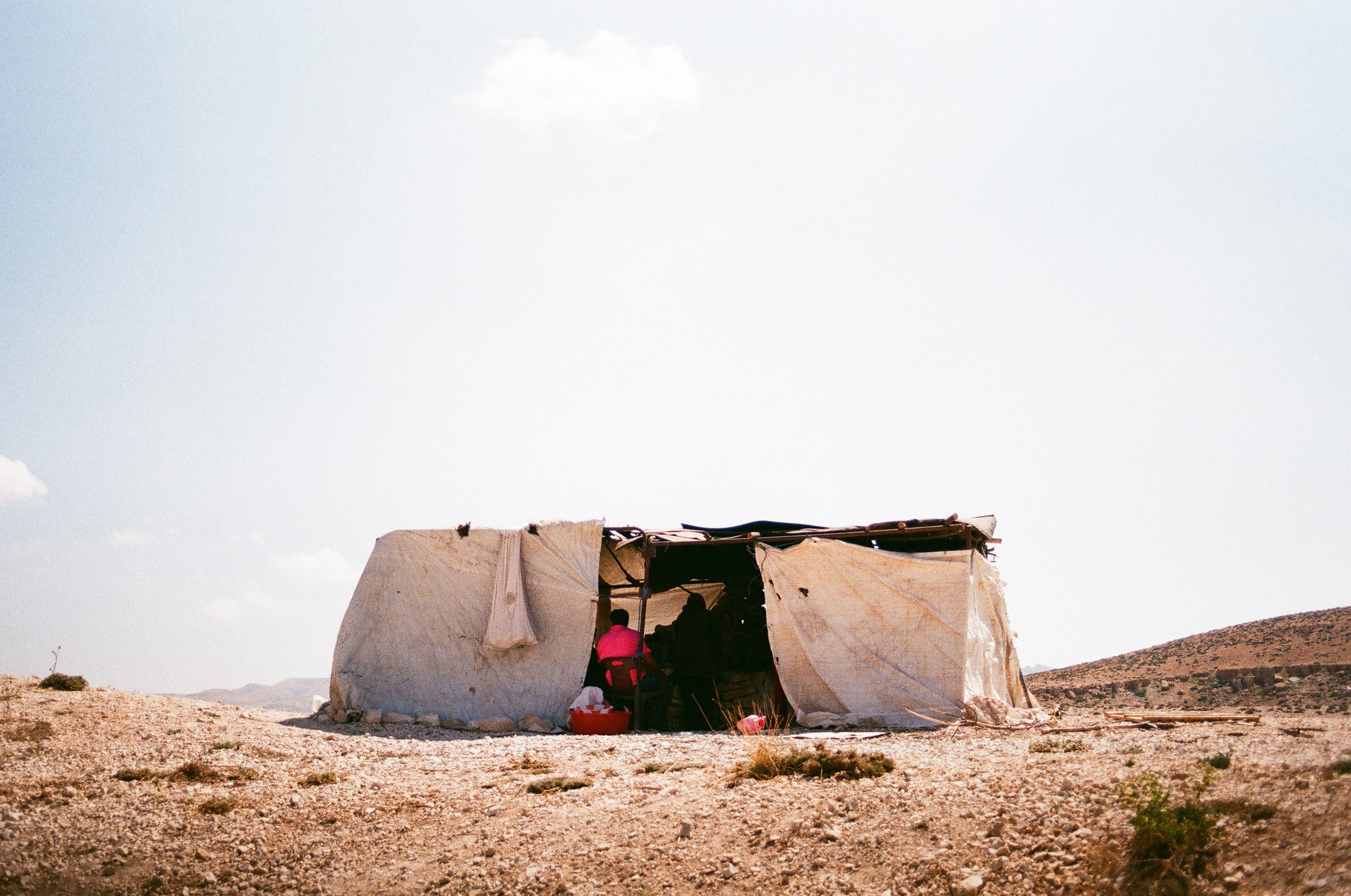 Open tent, pink shirt. Jurd al-Mneitra, Mount Lebanon, Lebanon, August 2019