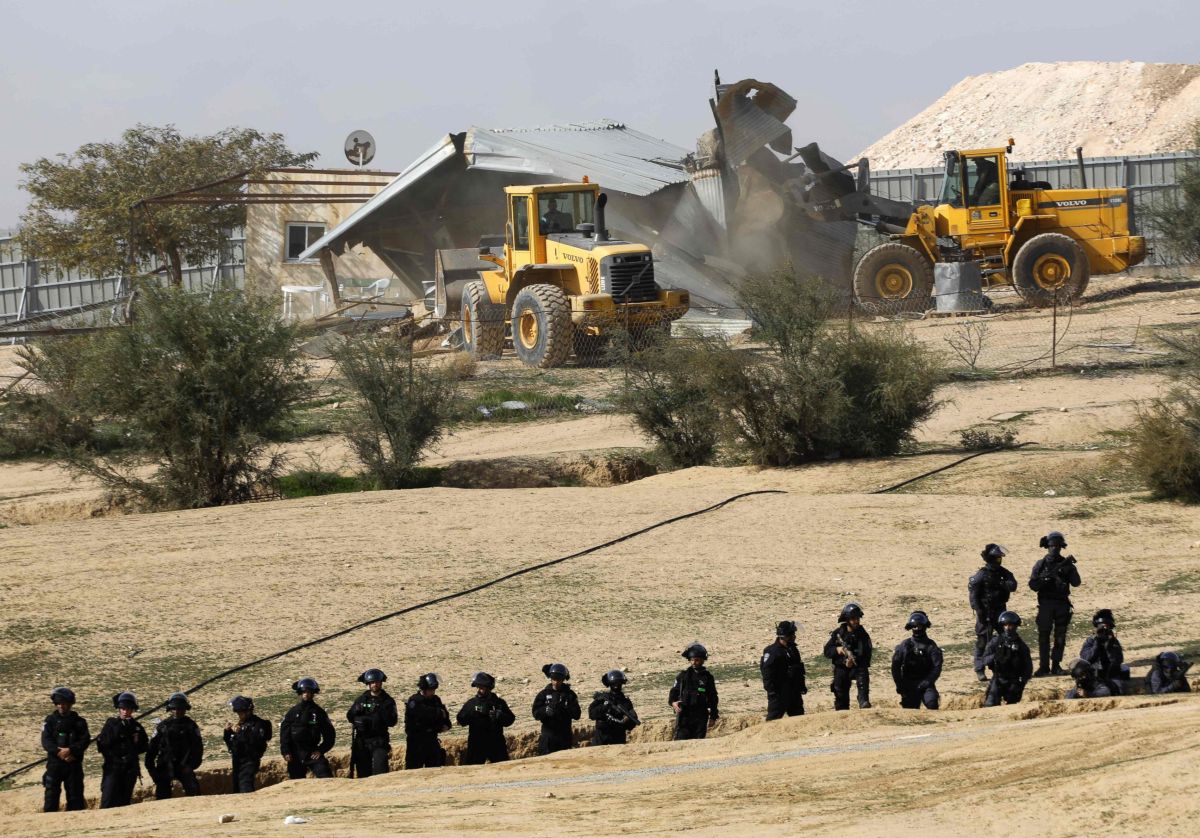 Oct. 7 hero Youssef al-Ziadna watches as Israel demolishes his Bedouin neighborhood