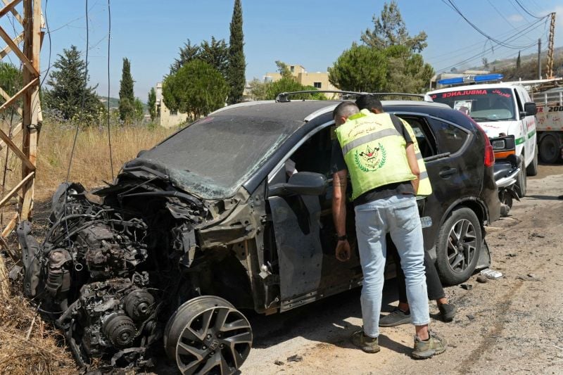 Pictured: Israeli drone strike on a car in Kfar Roummane
