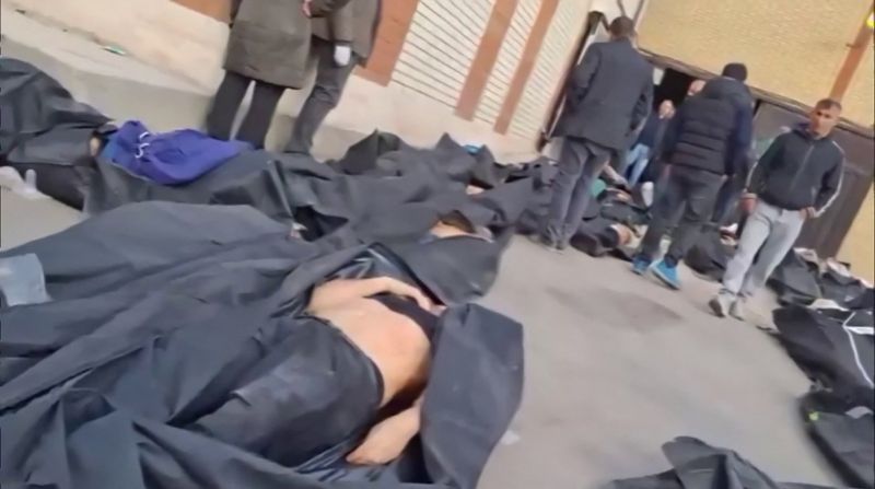 In images: Bodies of Iranian protesters lie on the ground in a medical center
